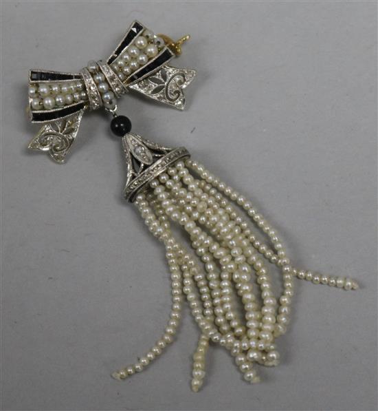 A gold, black onyx, diamond and seed pearl set drop multi strand tassel brooch, wit ribbon bow suspension, 45mm.